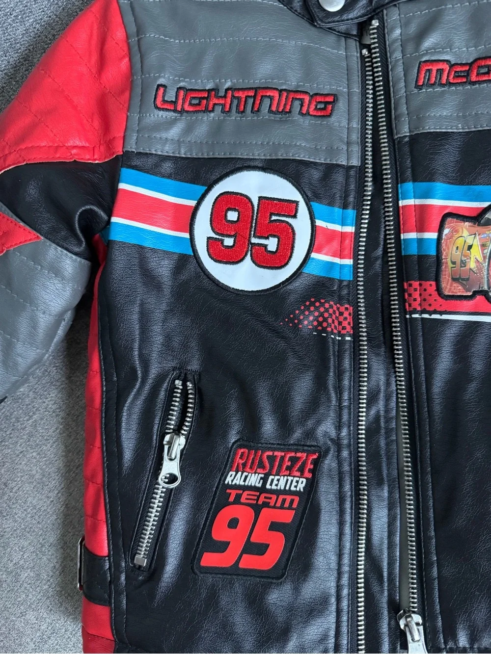 Official Disney/Pixar Lightning McQueen Kid’s Faux Leather Jacket, Size 3T Red